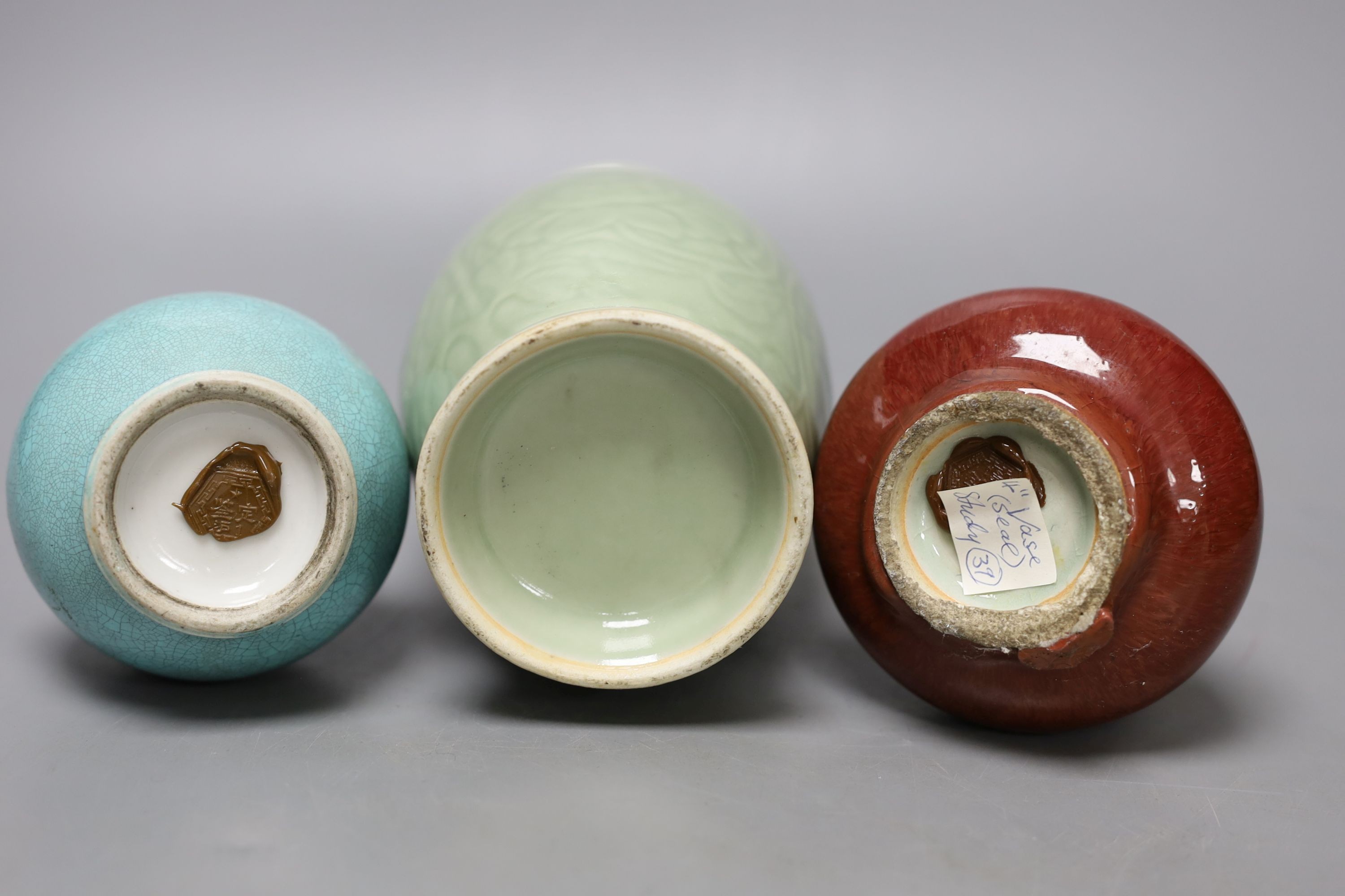 Three 19th Chinese monochrome glazed vases, with sang de boeuf, celadon and turquoise crackle glaze, tallest 21 cm